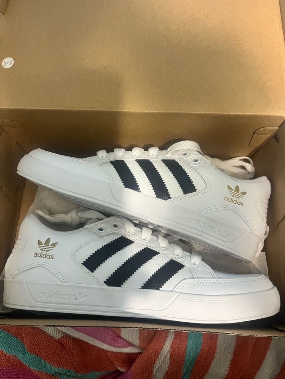 adidas Men’s White Sneakers with Black Stripes and Gold Logos